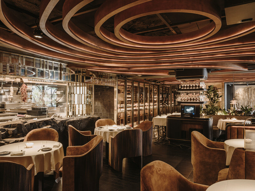sculptural wooden ceiling tops astet studio leña marbella restaurant in spain