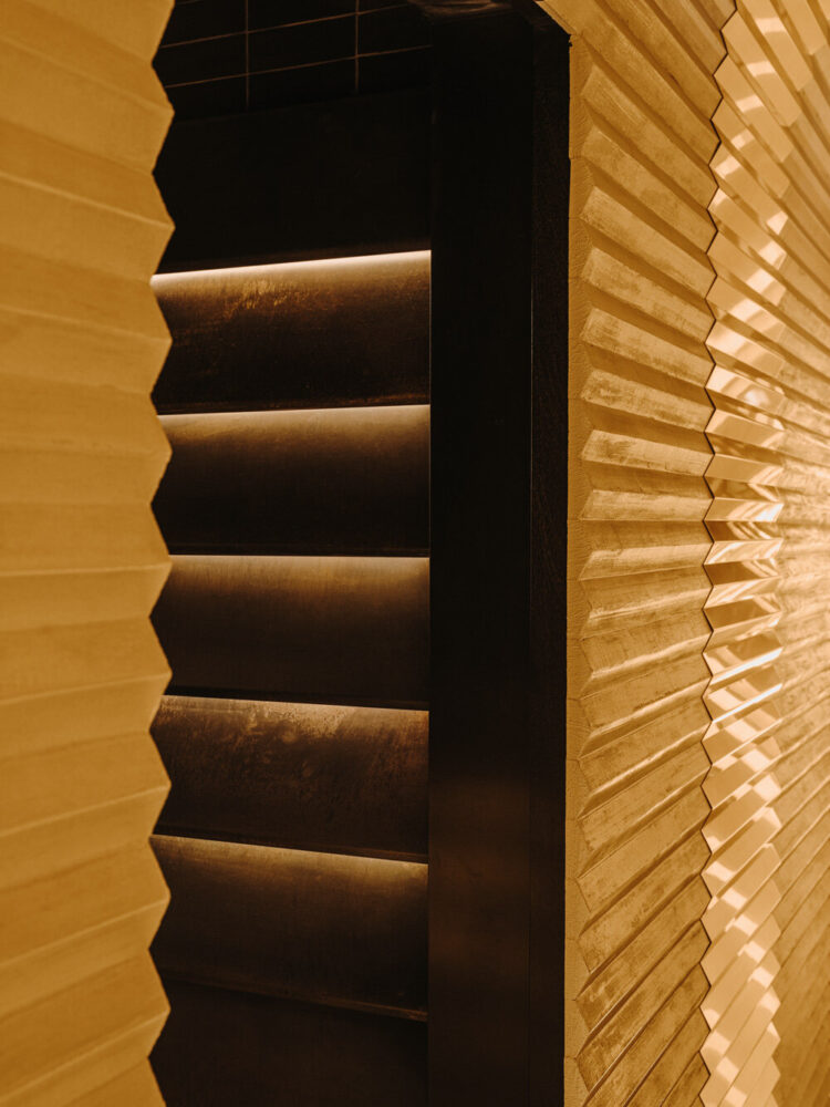 pyramidal forms draw the walls and doors for the toilet cabins