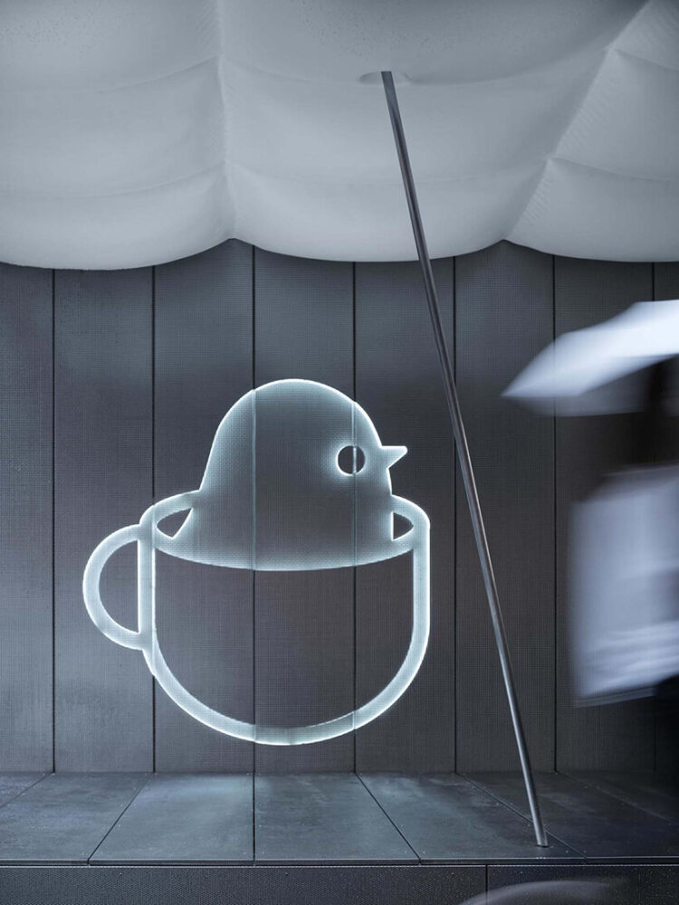 F.O.G. architecture’s birdie cup coffee is nested beneath a roof of floating white puffs