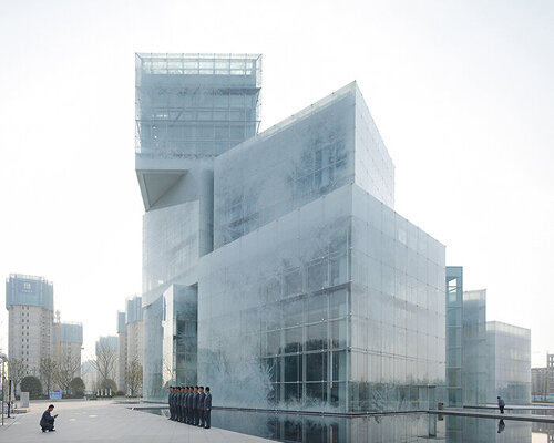 new cultural tourism center in china designed as shapeshifting, frozen ice cubes