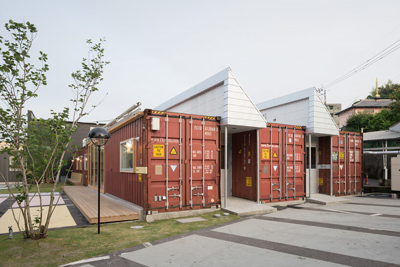 second-hand red shipping containers form 'kotobuki' cheese factory by micelle in japan