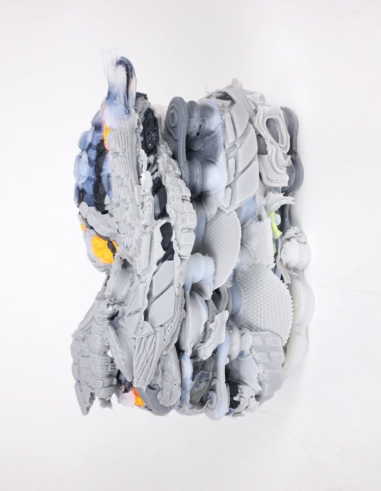 collaged soles with recycled TPU pieces and EVA midsoles