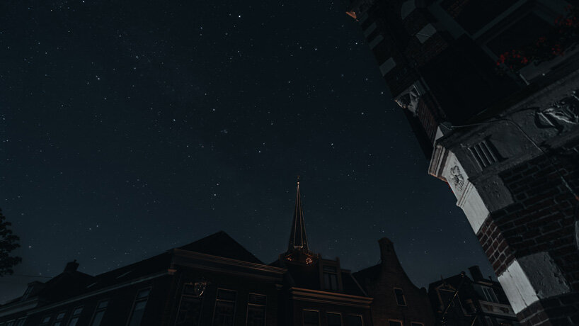daan roosegaarde and UNESCO switch off a dutch city's lights to see the stars as heritage