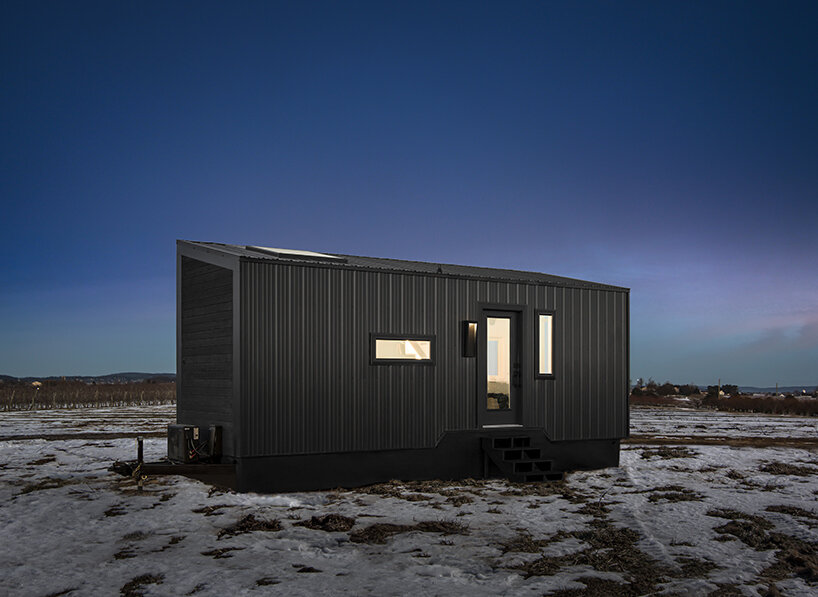 stands on a 25-foot double axle trailer