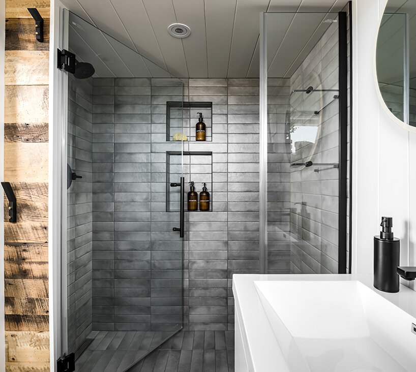 the bathroom is located at the one edge of the house