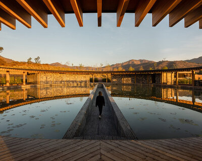 sordo madaleno arquitectos' valle san nicolás clubhouse floats atop a lake in mexico