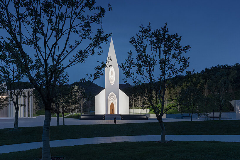 RSAA encloses chamber church with illuminated layered silhouettes in china 