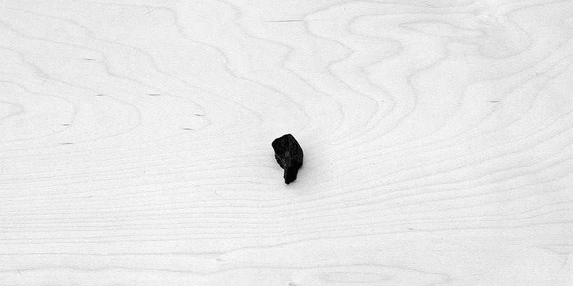 clock made of coal ticks down to climate change in new artwork by reza aliabadi