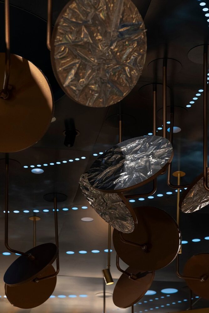 large and small spotlights arranged on the ceiling