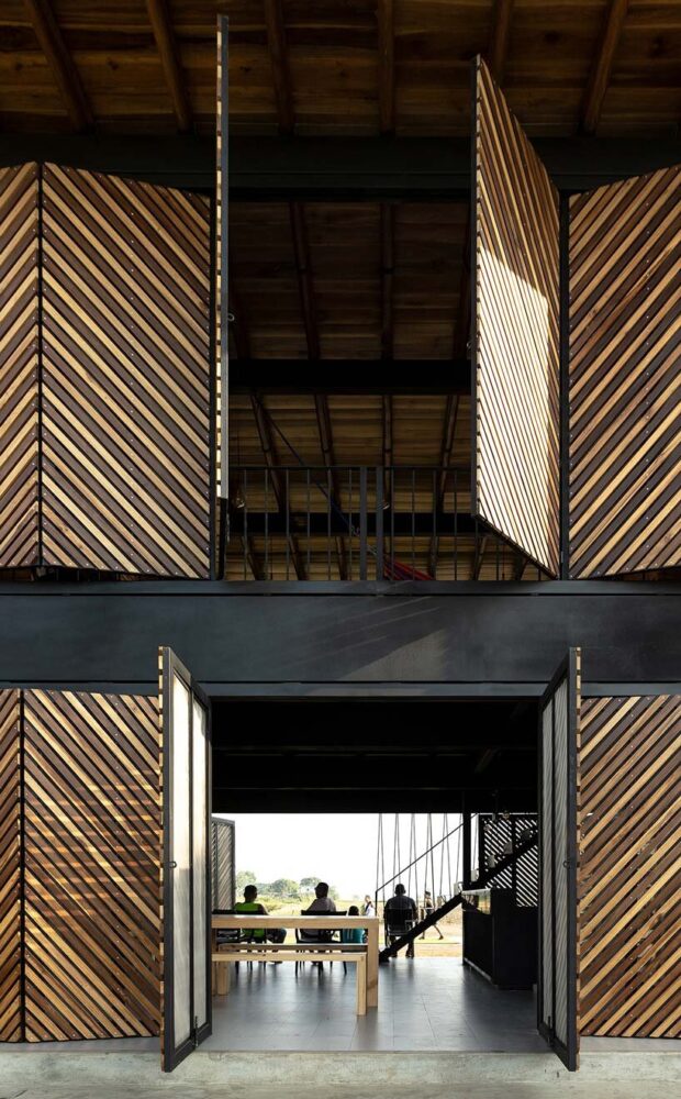 natura futura uses folding metal panels to design a sports center in rural ecuador