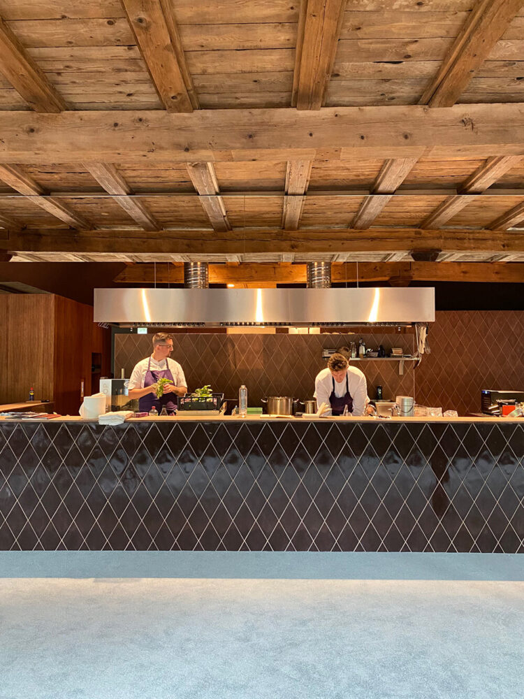 open-plan kitchen creates a visual connection with the guests 