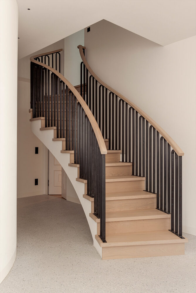 a twisted stair rises the residents to the upper floor