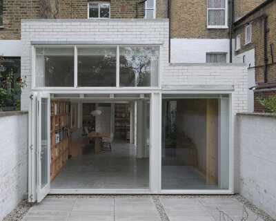 hugh strange nestles a modern 'photographer's house' intervention in historic london