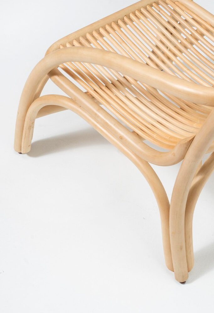 the furniture pieces combine thick rattan rattles with fine vines 