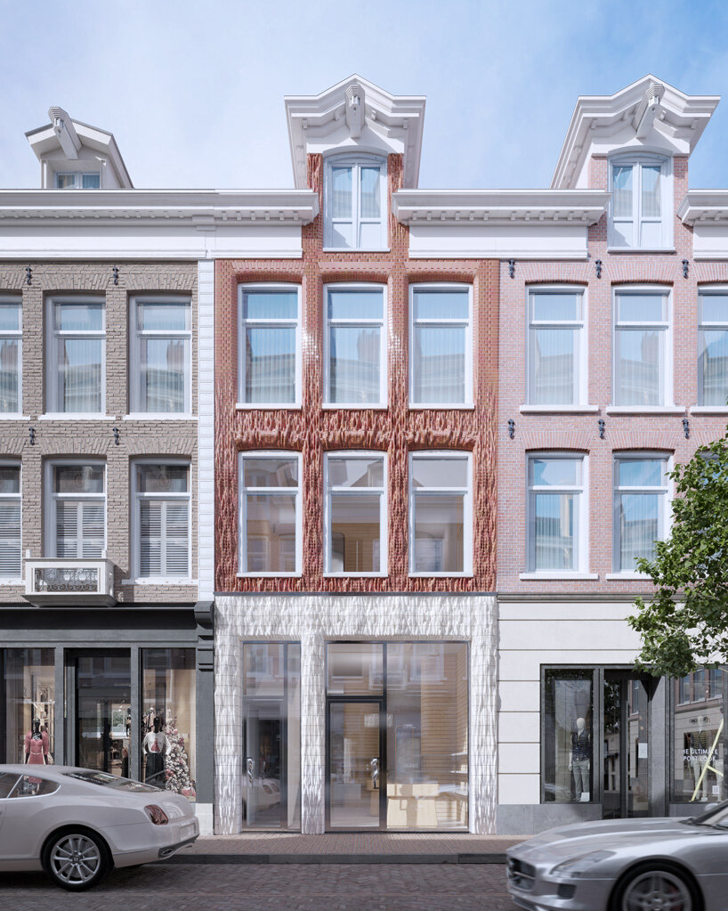 studio RAP 3D prints ceramic tiles and red bricks for amsterdam boutique facade