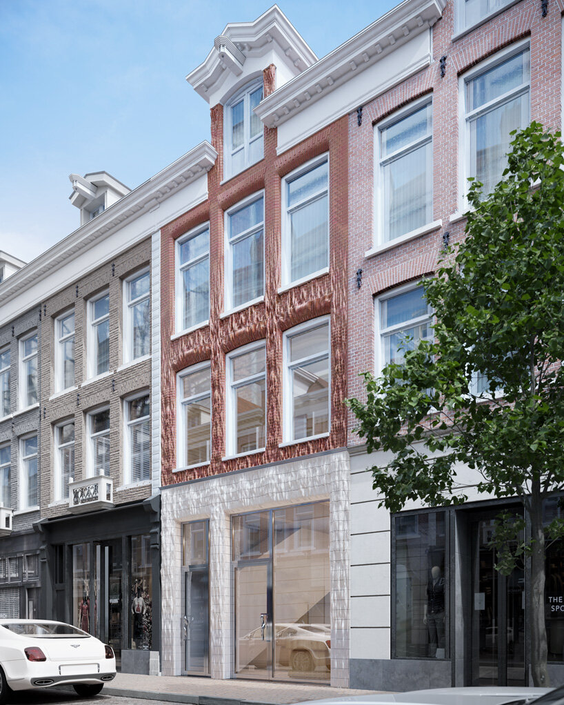 studio RAP 3D prints ceramic tiles and red bricks for amsterdam boutique facade