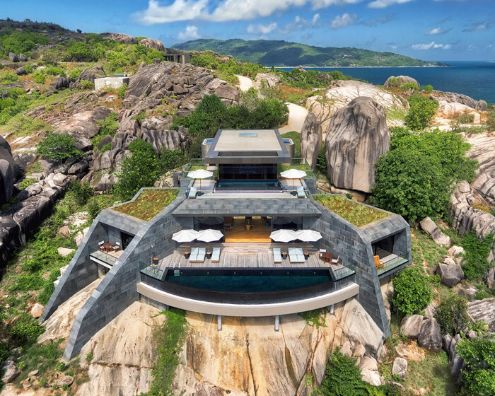 four angular holiday homes nestle into granite outcrops in the seychelles