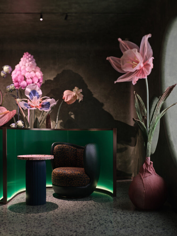 unreal-sized flowers dance in the space