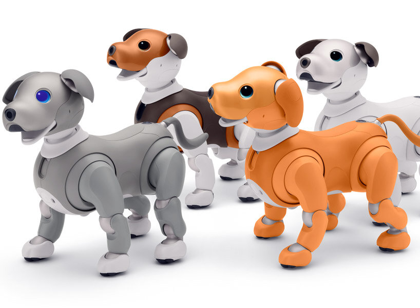 sony’s puppy robot can now be carried with its new sling that resembles a baby carrier