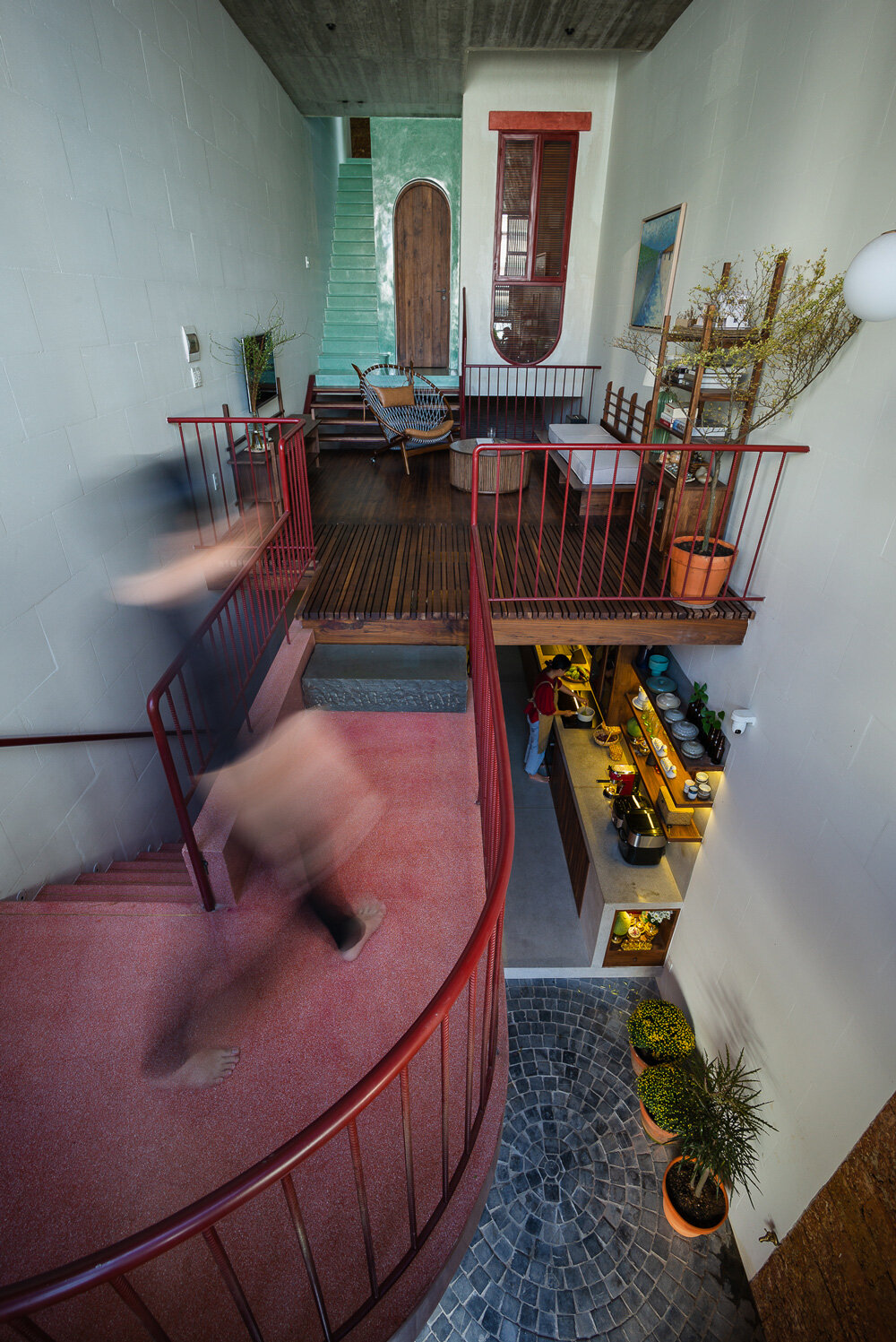 wooden revolving shutters clad the facade of AD9 architects' H house in ...