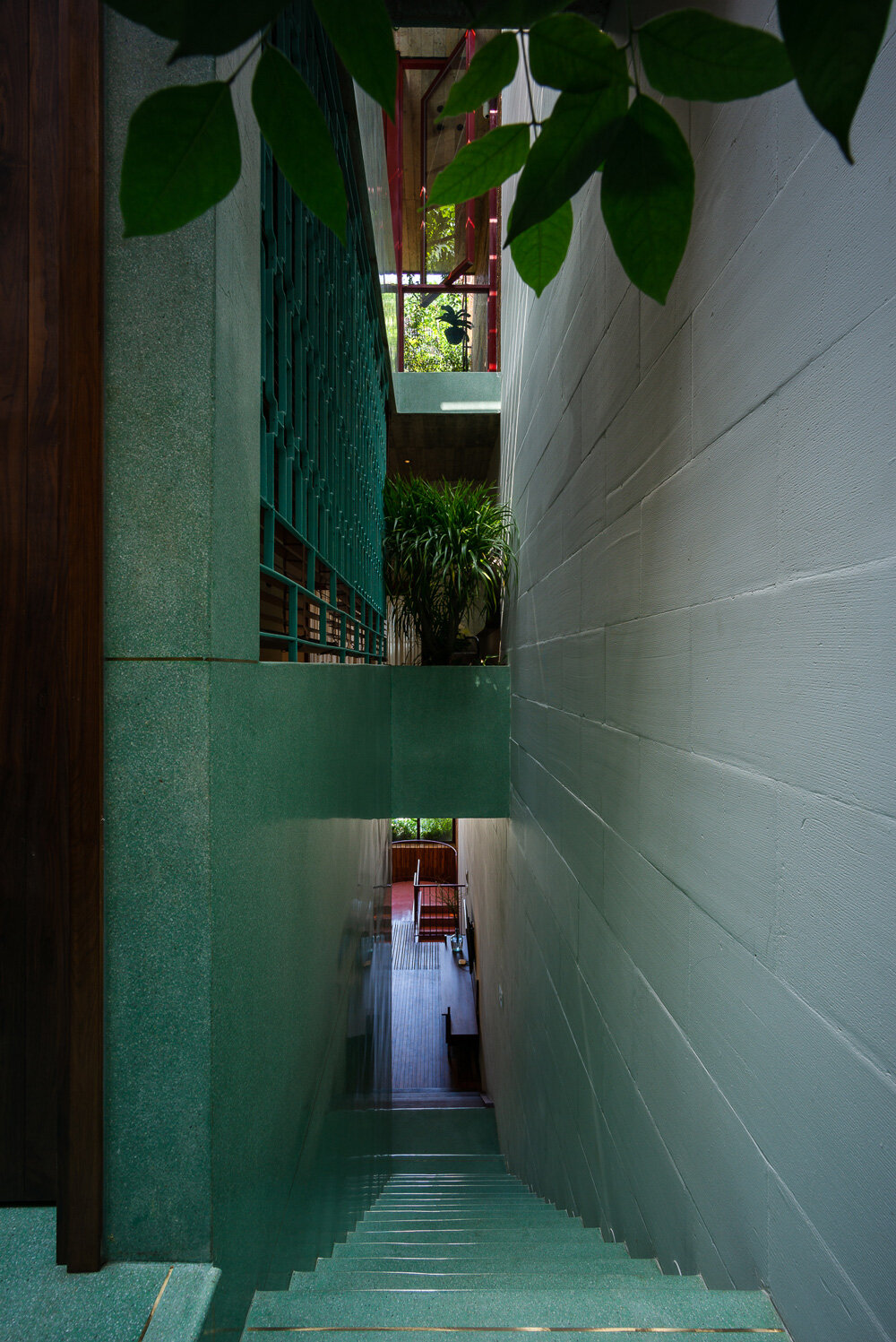 wooden revolving shutters clad the facade of AD9 architects' H house in ...