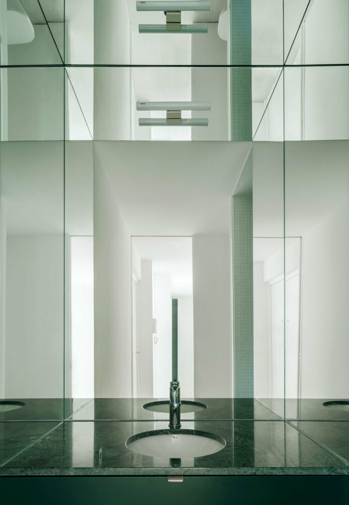 green marble and mirrors in the bathroom
