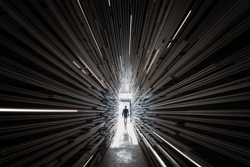 layered aluminum strips evoke dandelion seeds for this museum façade in bangkok - 4