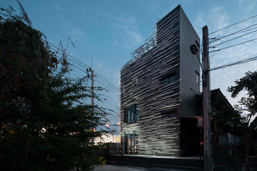layered aluminum strips evoke dandelion seeds for this museum façade in bangkok - 7