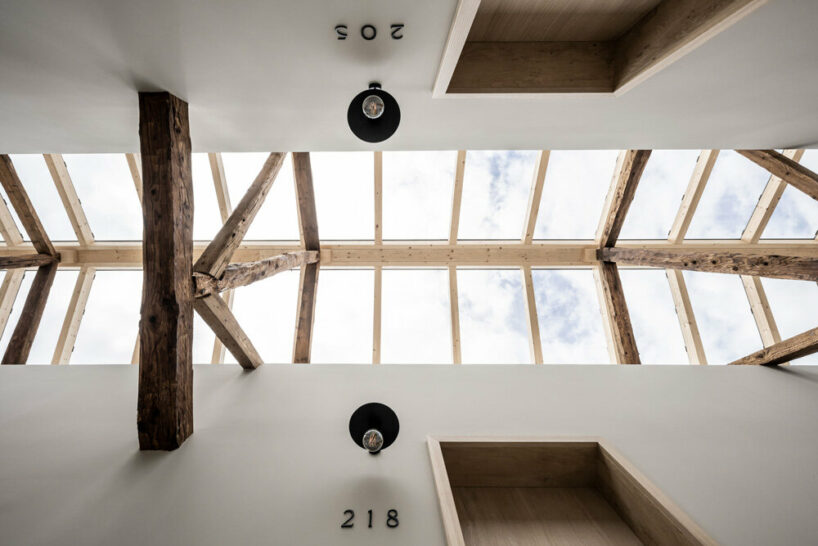 the restored wooden trusses pay homage to their original function