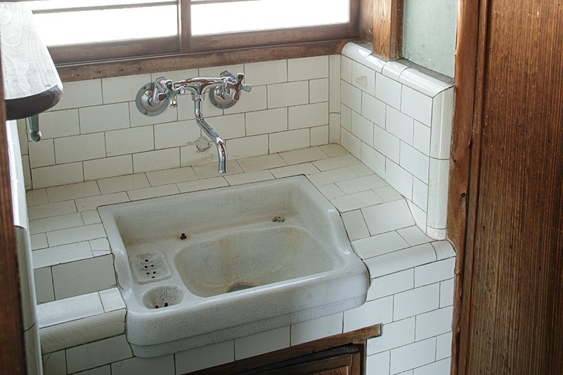 the washbasin is still in surprisingly well condition, considering it was made nearly a hundred years ago