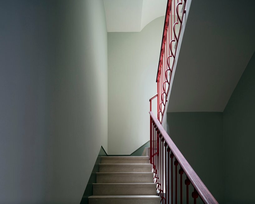 the main staircase of the house is restored and partly rebuilt, re-adapting the original railing