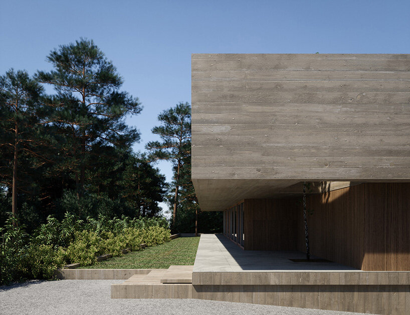 Central patio invites the surrounding nature inside OODA's Casa CM in Portugal
