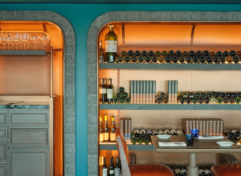 sky-high ‘the cellar’ by andré fu studio seats 28 diners and holds 400 premium wine labels