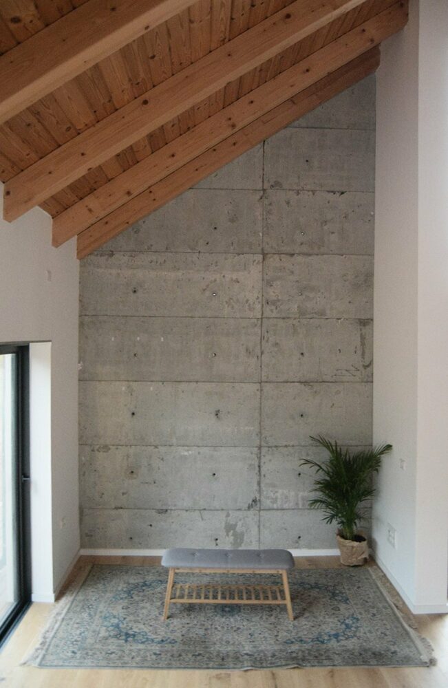 concrete, glass, wood and white gypsum