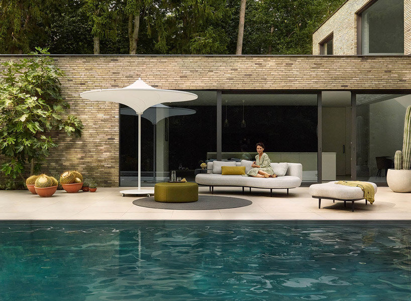 belgium-designed hulasol is a sun umbrella by day and an outdoor lamp by night