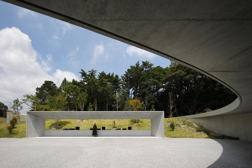 KINO architects completes japanese cemetery with arc-shaped plaza for contemplation