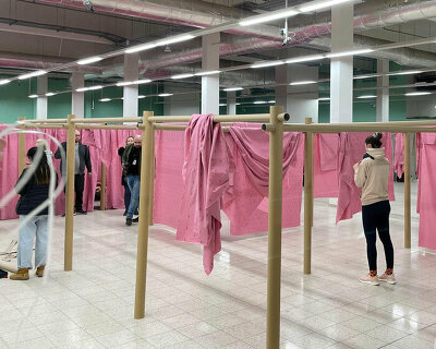 shigeru ban and VAN install paper partition shelters for ukrainian refugees in europe