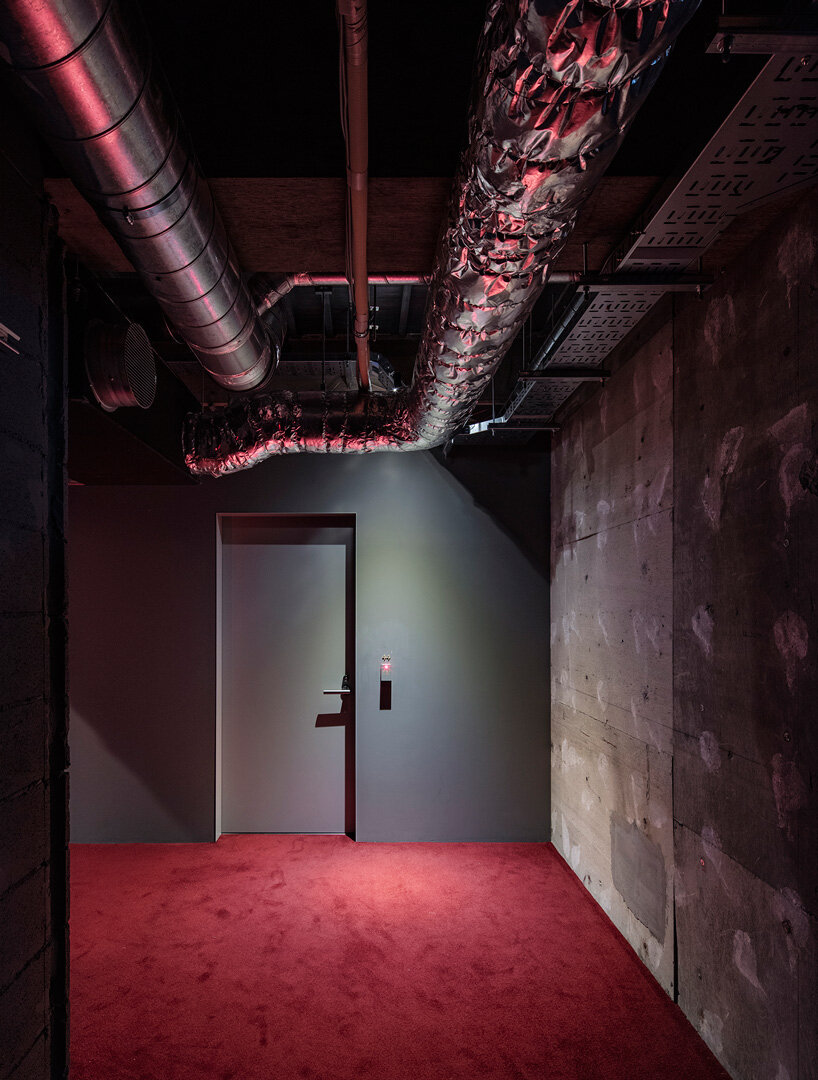 suppose design office inserts bookstore inside renovated hot spring hotel in japan