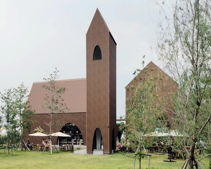 ASWA creates this 'take a breath' café as a group of arcaded barns in thailand