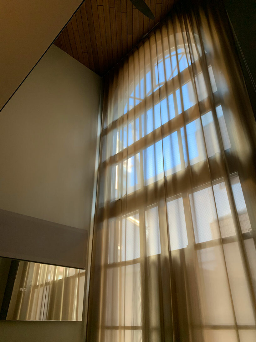 arte-1 architects designs a narrow house with a big glass door in tokyo - 4