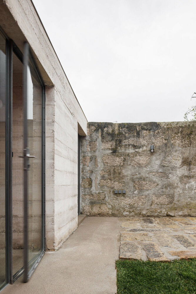 white concrete meets the existing garden wall