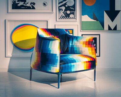 artist felipe pantone adds pixelated patterns to poltrona frau’s archibald armchair