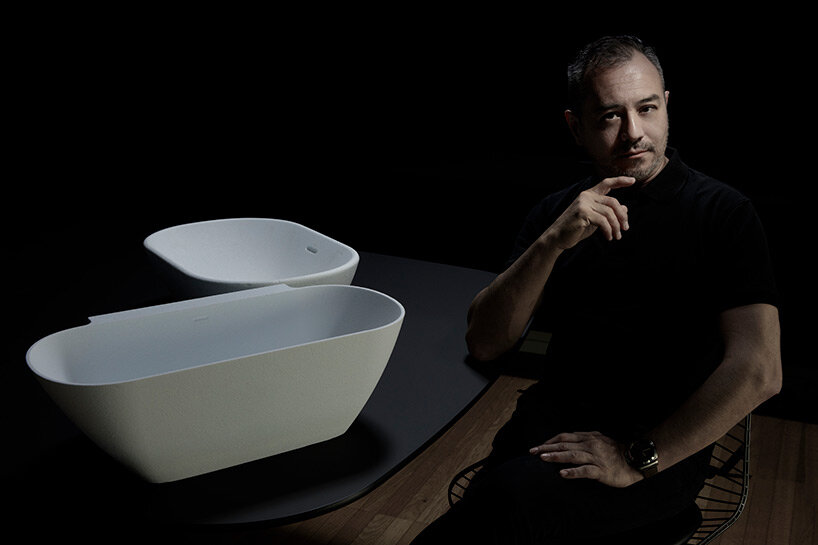 Toan Nguyen in his studio in Milan with some prototypes of the LUA collection, in which all the elements are in perfect tune, with an ideal balance of form, function and sensorial pleasure. Picture by Mattia Balsamini