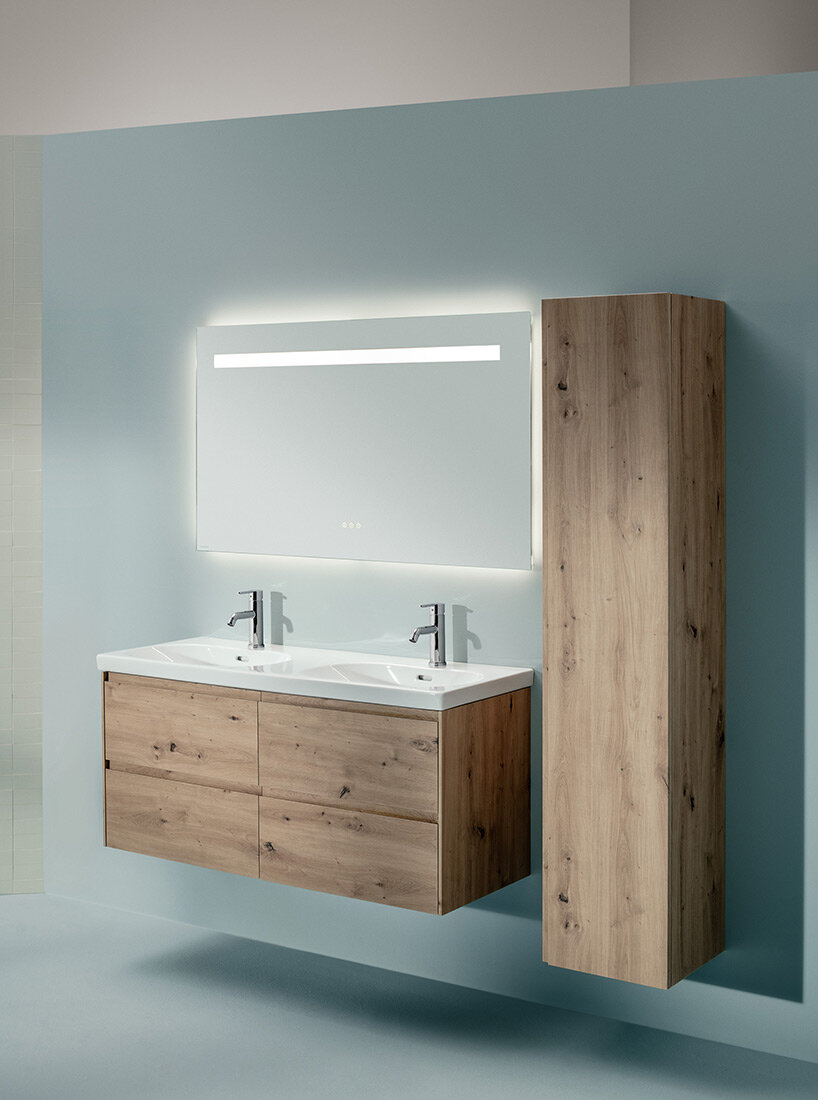 the LANI furniture set was designed by Toan Nguyen to match exactly the LUA bathroom objects and faucets. It also features high-quality details such as slim side panels or recessed doors that feature indented handles; here with wild oak wood finish surface.