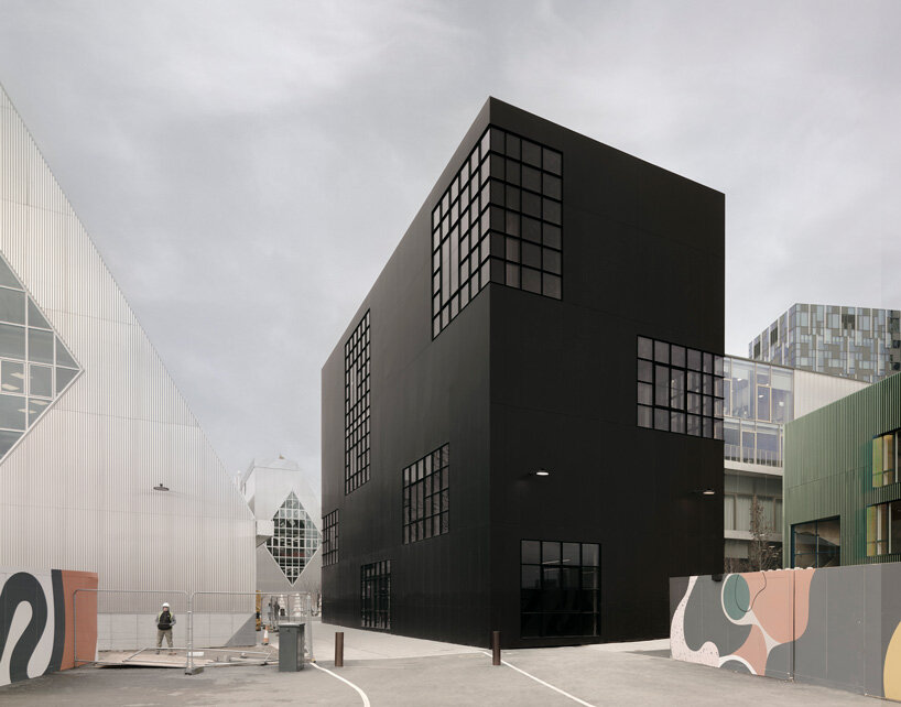 polished aluminum clads artists' ateliers by barozzi veiga at london's design district