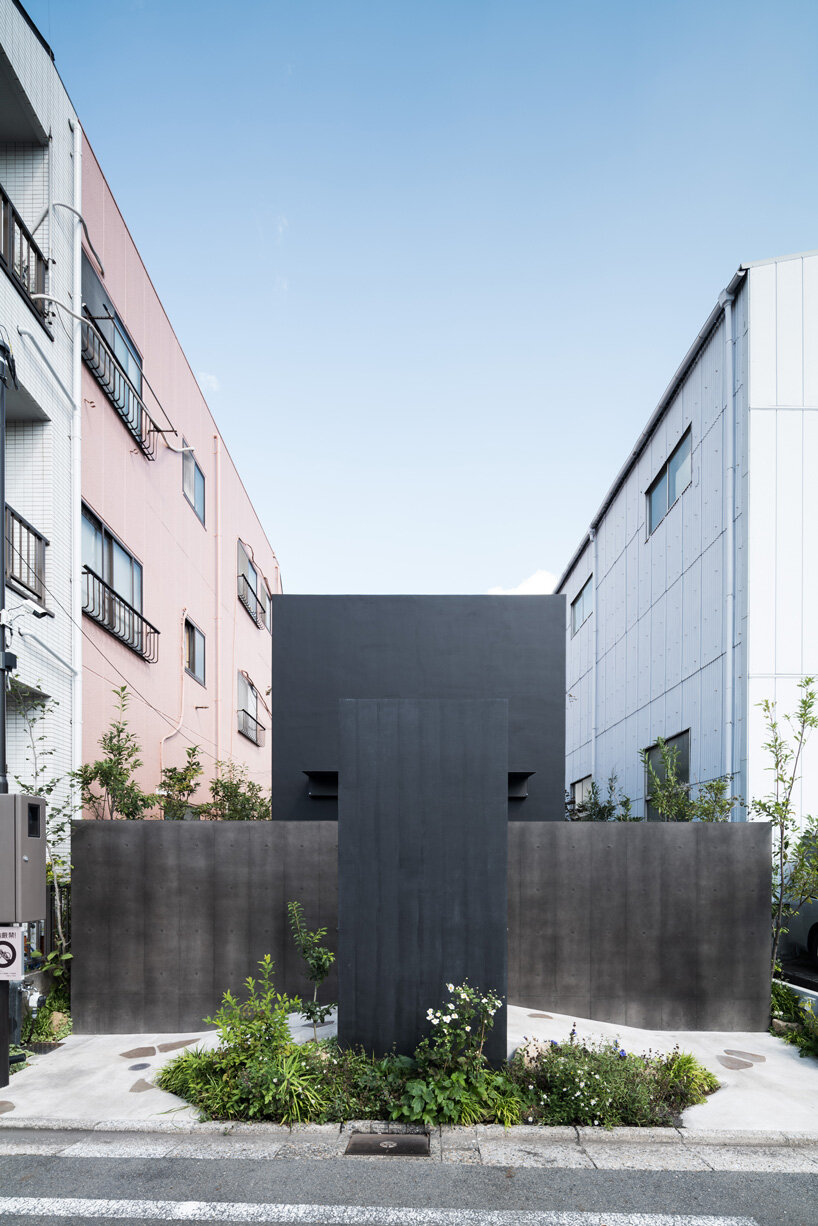 black tones unify this japanese temple's ossuary and tree burial facility by love architecture