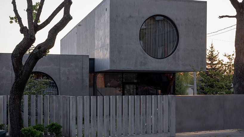 g.natkevicius & partners has completed a monumental two-story residence with a basement right in the heart of kaunas, lithuania.