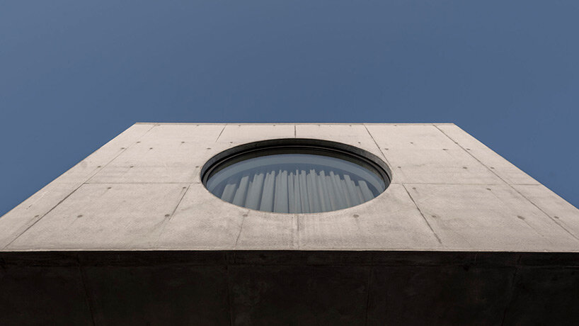 g.natkevicius & partners has completed a monumental two-story residence with a basement right in the heart of kaunas, lithuania.