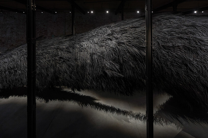 saudi arabia pavilion presents enigmatic 40-meter-long palm frond installation at venice art biennale