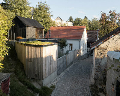 SENAA renovates a goat shed in czech village of bukovany into a contemporary weekend house
